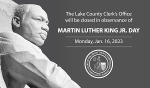 A marble statue of Dr. Martin Luther King, Jr., and the words "The Lake County Clerk's Office will be closed in observance of Martin Luther King Jr. Day, Monday Jan. 16, 2023"