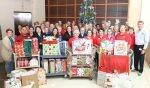 Clerk Gary Cooney and staff are joined by Linda Krupski, founder of LovExtension, along with volunteer representatives from the organization.