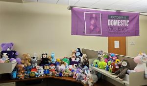 A large group of stuffed animals for donation in support of Domestic Violence Awareness Month