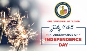 Celebratory firework sparklers are burning with an American Flag in the background and the words, "Our Office will be closed July 4 & 5 in observance of Independence Day."