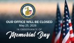 The sun is setting in the background with American flags solemnly placed in the ground and the words, "Our office will be closed May 25, 2026, in observance of Memorial Day."
